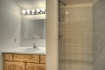 Ensuite bathroom with shower, vanity and toilet 